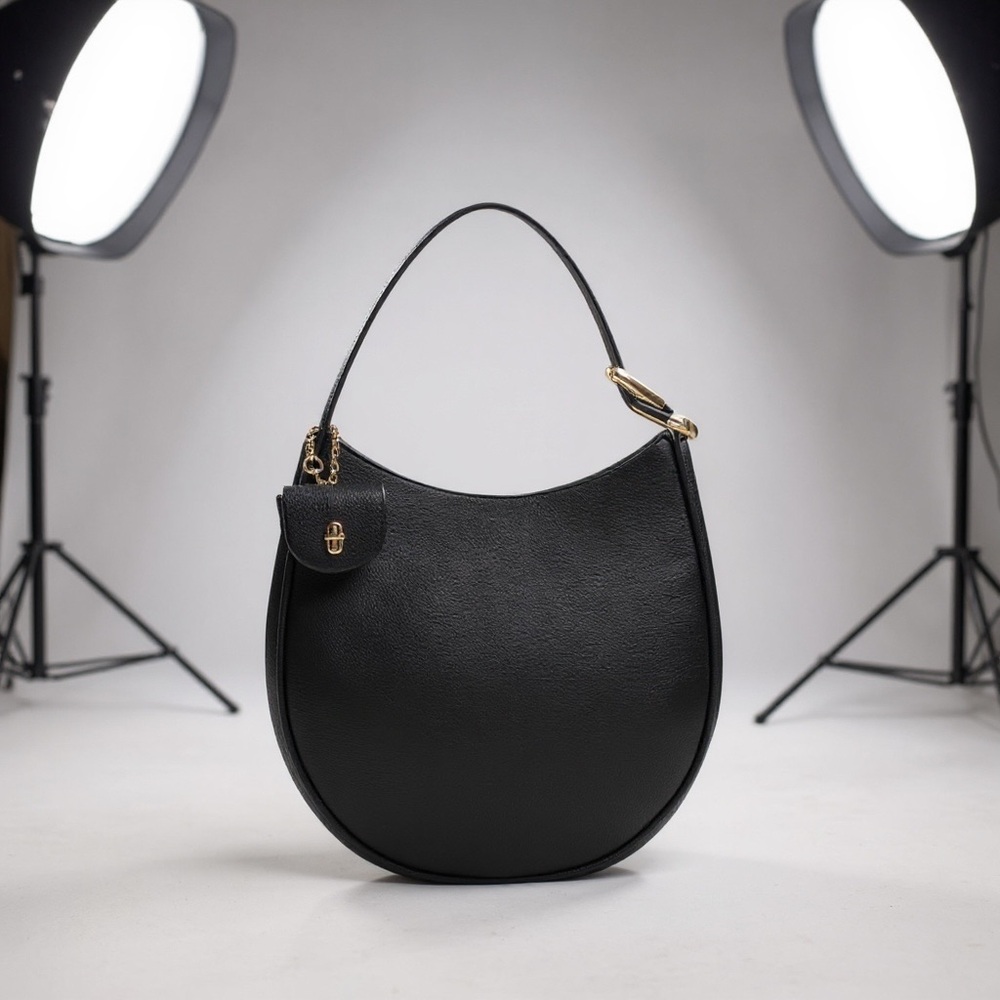 Marc Jacobs
The Crescent Large Dual Hobo Bag in Calf